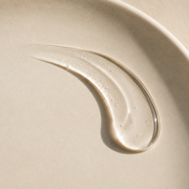 Texture transparente de gel silicone sur céramique ivoire — glisse du lubrifiant Concept S